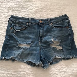 Distressed denim shorts